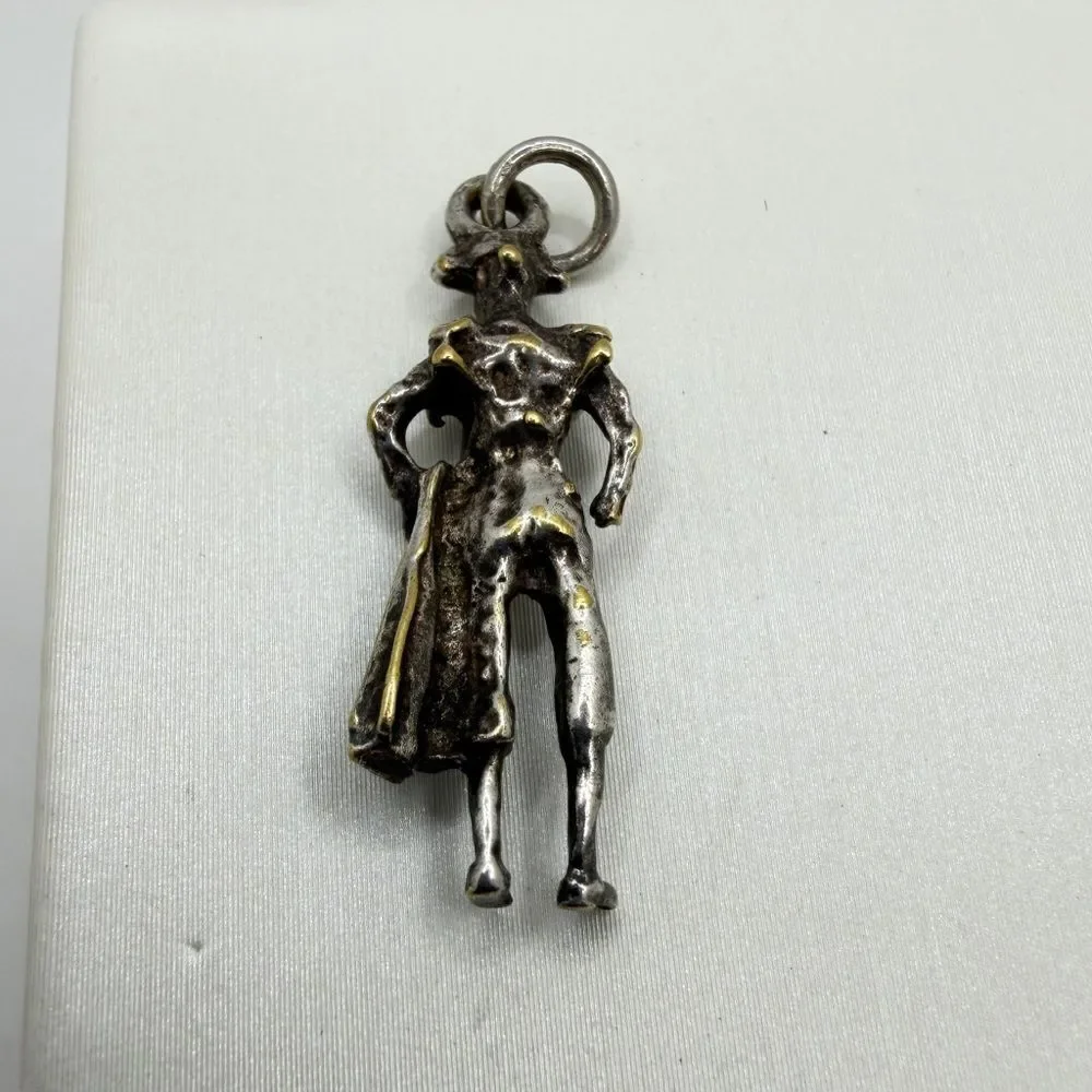 Silver tone metal Vintage Matador Charm/Pendant!‎